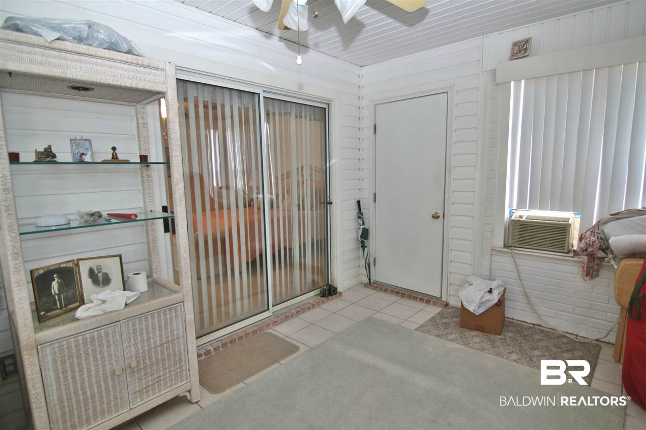 9592 Villas Drive, Unit 21B Foley, AL 36535 - Photo 18 of 25 Enclosed Porch