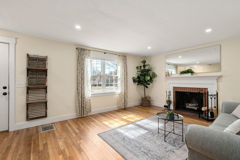31 Sunset Drive Northborough, MA 01532 - Photo 13 of 33 a living room with furniture and a fireplace