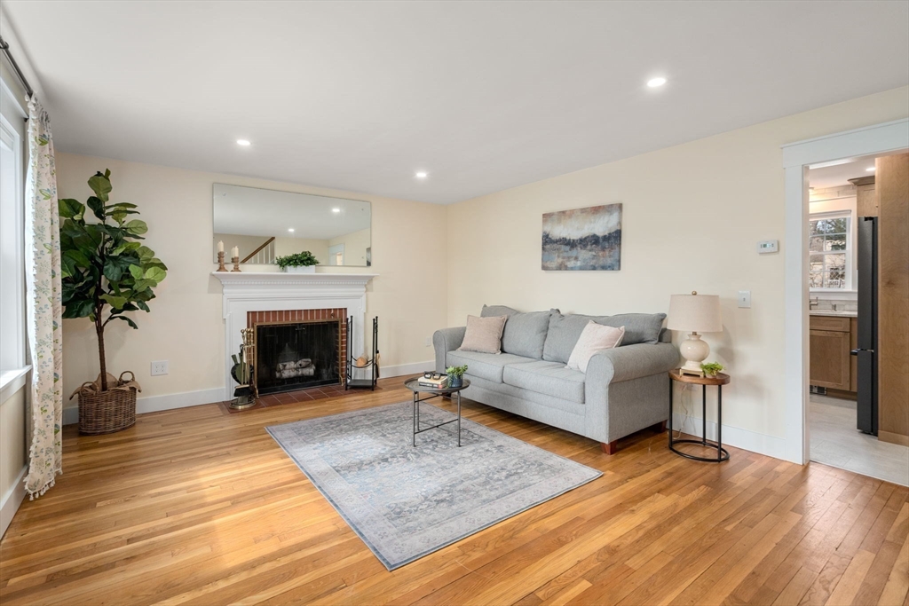 31 Sunset Drive Northborough, MA 01532 - Photo 14 of 33 a living room with furniture and a fireplace