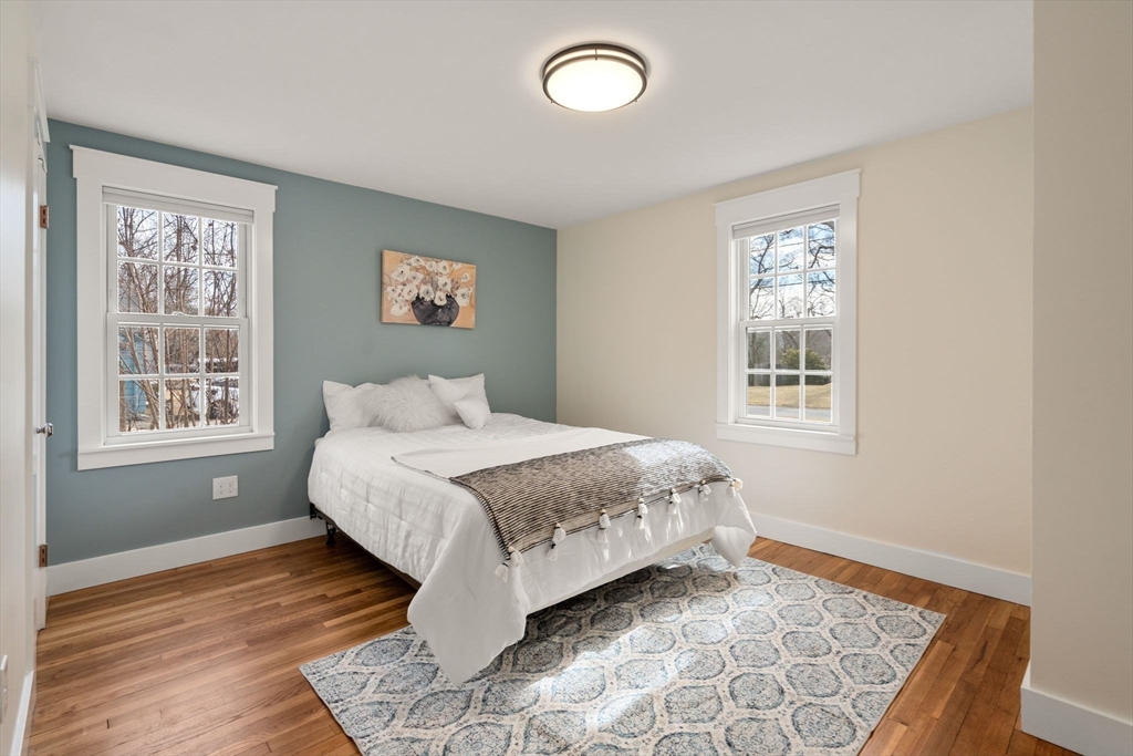31 Sunset Drive Northborough, MA 01532 - Photo 15 of 33 a spacious bedroom with a bed and a window