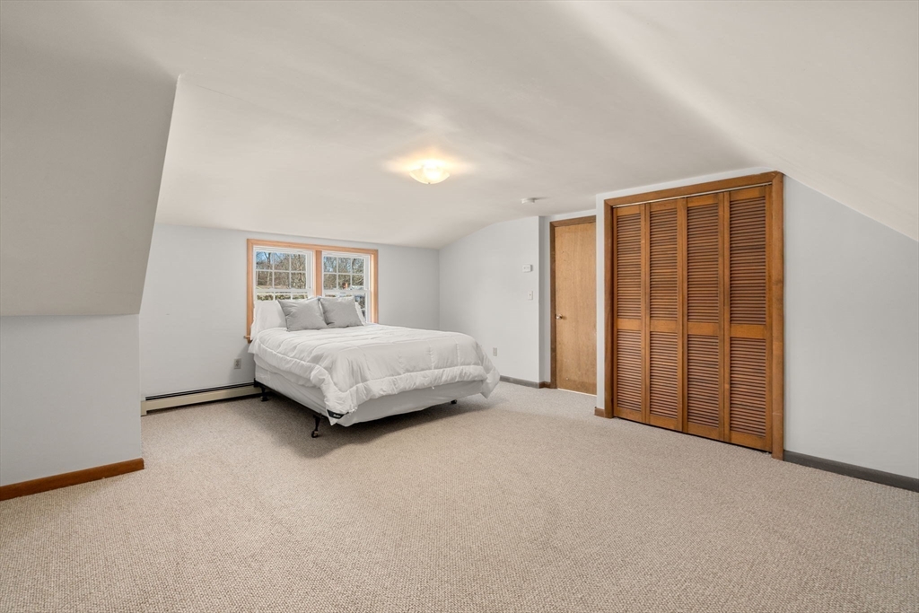 31 Sunset Drive Northborough, MA 01532 - Photo 18 of 33 a bedroom with a bed and a window