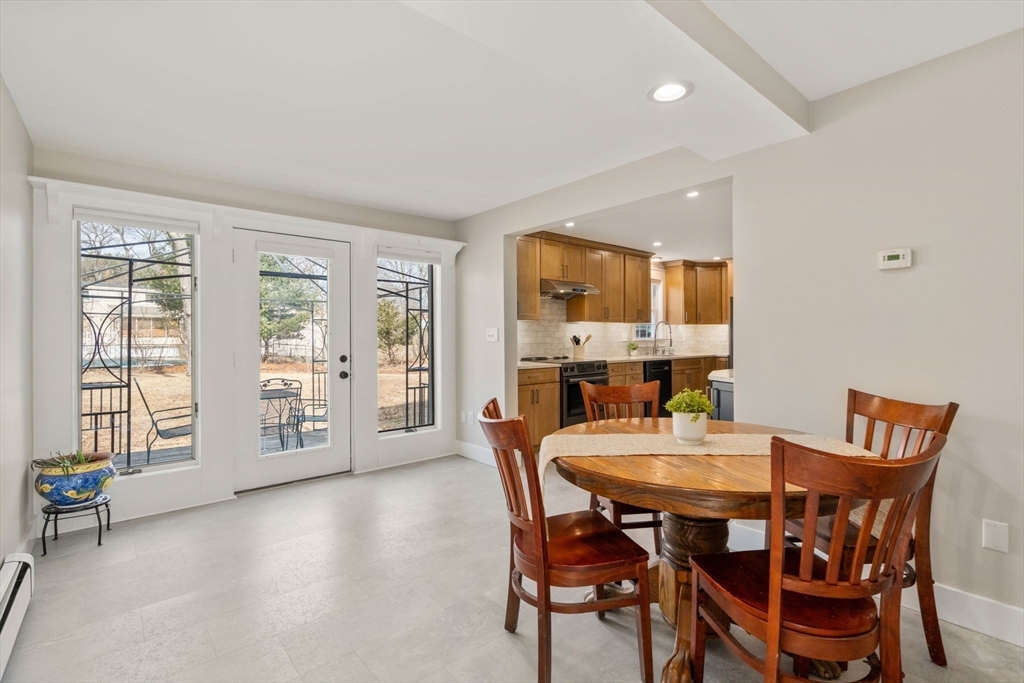 31 Sunset Drive Northborough, MA 01532 - Photo 6 of 33 a view of a dining room with furniture and wooden floor