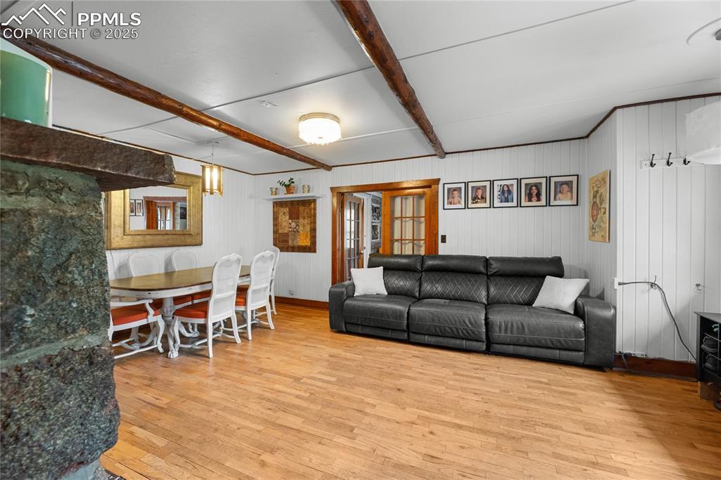 9270 Picabo Road Cascade, CO 80809 - Photo 12 of 31 a living room with furniture and a wooden floor