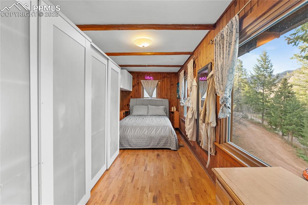 9270 Picabo Road Cascade, CO 80809 - Photo 13 of 31 a view of entryway and hall with wooden floor