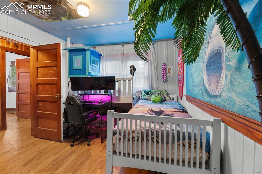9270 Picabo Road Cascade, CO 80809 - Photo 21 of 31 a living room with furniture and a fireplace