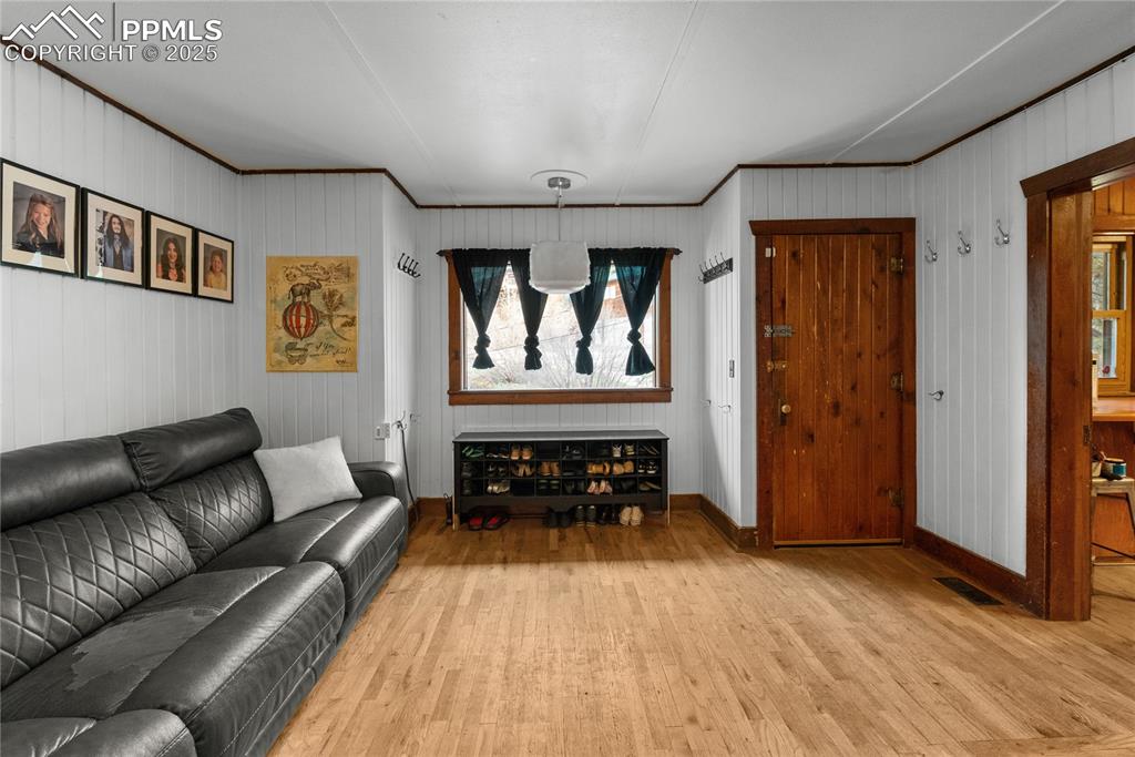 9270 Picabo Road Cascade, CO 80809 - Photo 7 of 31 a living room with furniture and a wooden floor