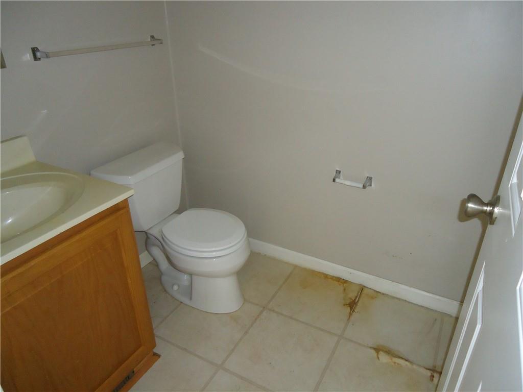 608 Reed Avenue Monessen, PA 15062 - Photo 11 of 20 a white toilet sitting next to a shower