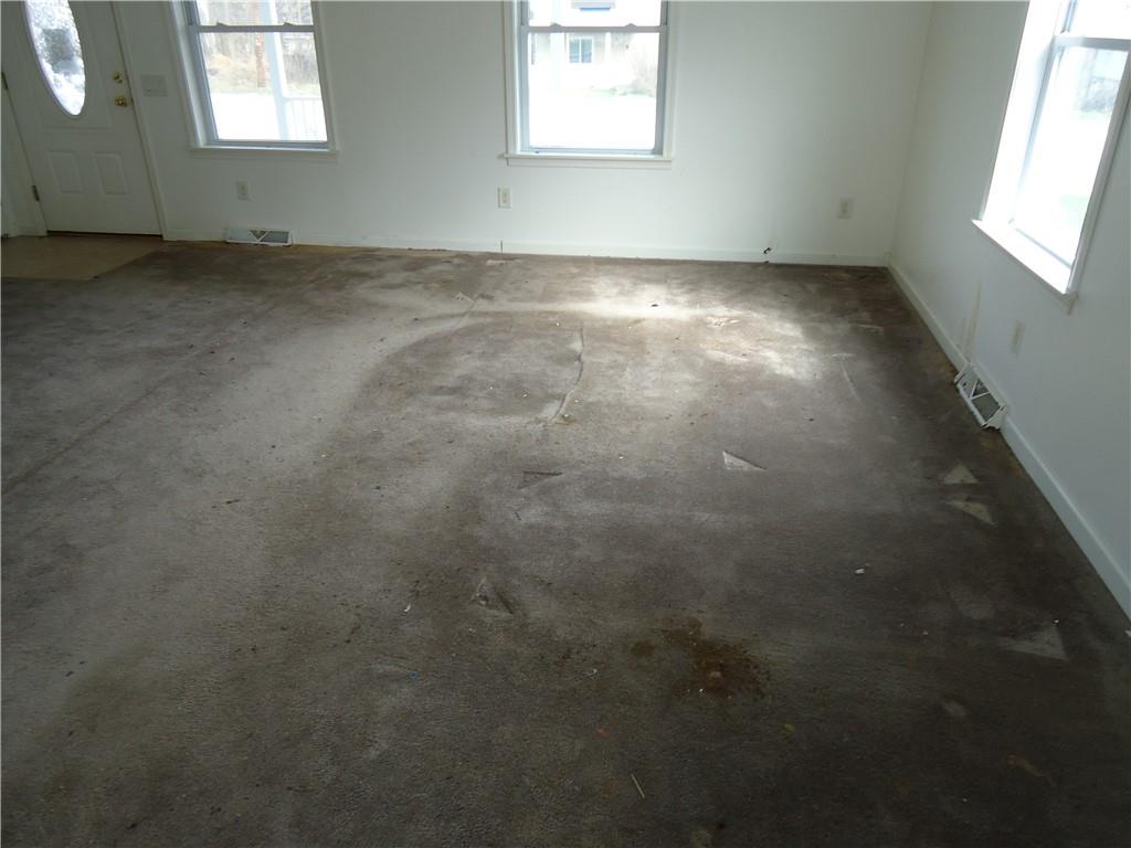 608 Reed Avenue Monessen, PA 15062 - Photo 3 of 20 an empty room with windows
