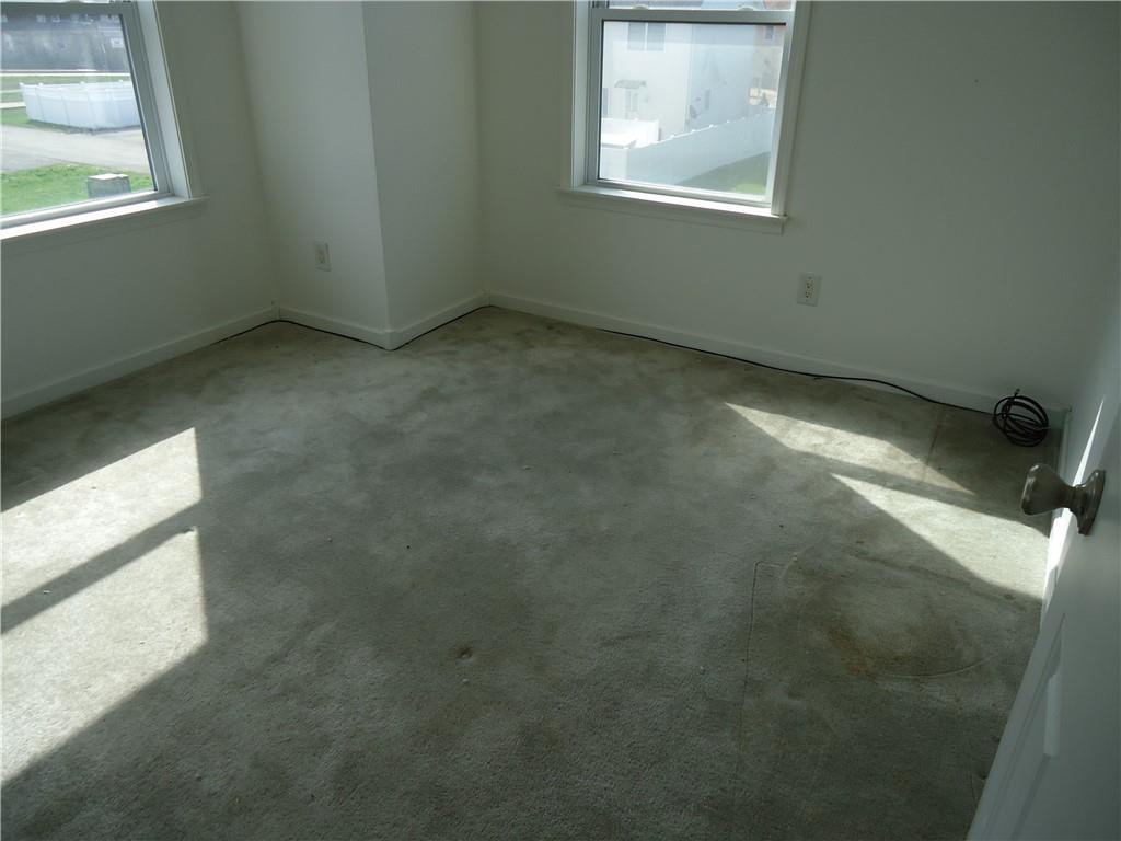 608 Reed Avenue Monessen, PA 15062 - Photo 9 of 20 a view of an empty room with a window
