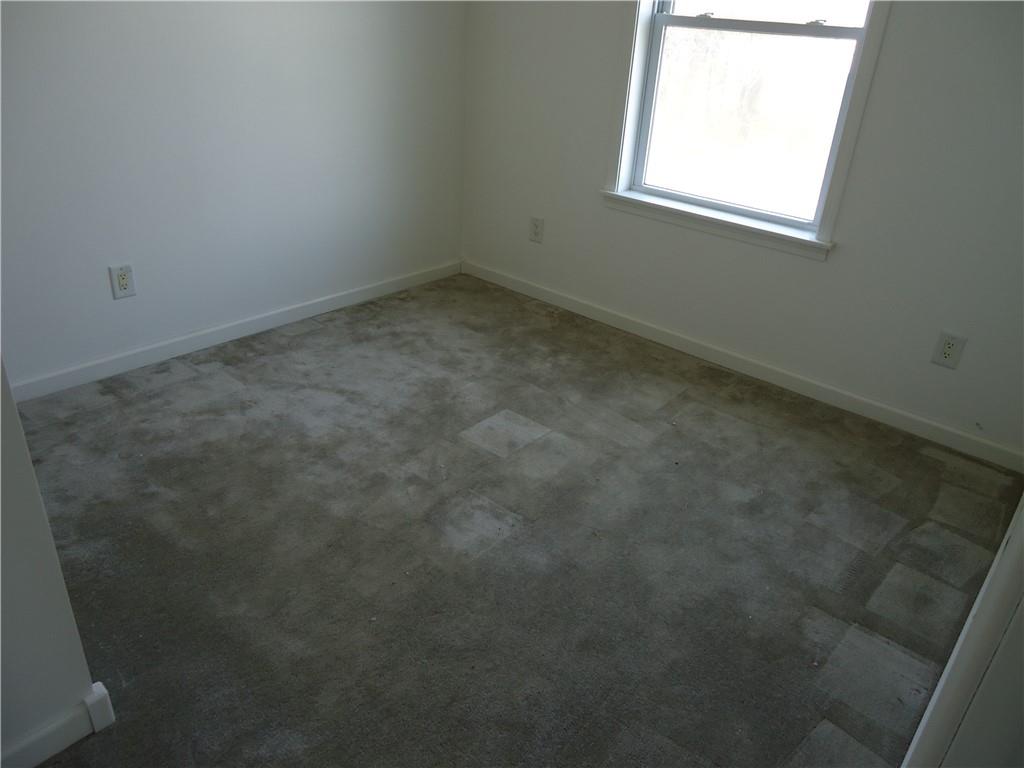 608 Reed Avenue Monessen, PA 15062 - Photo 10 of 20 an empty room with a window