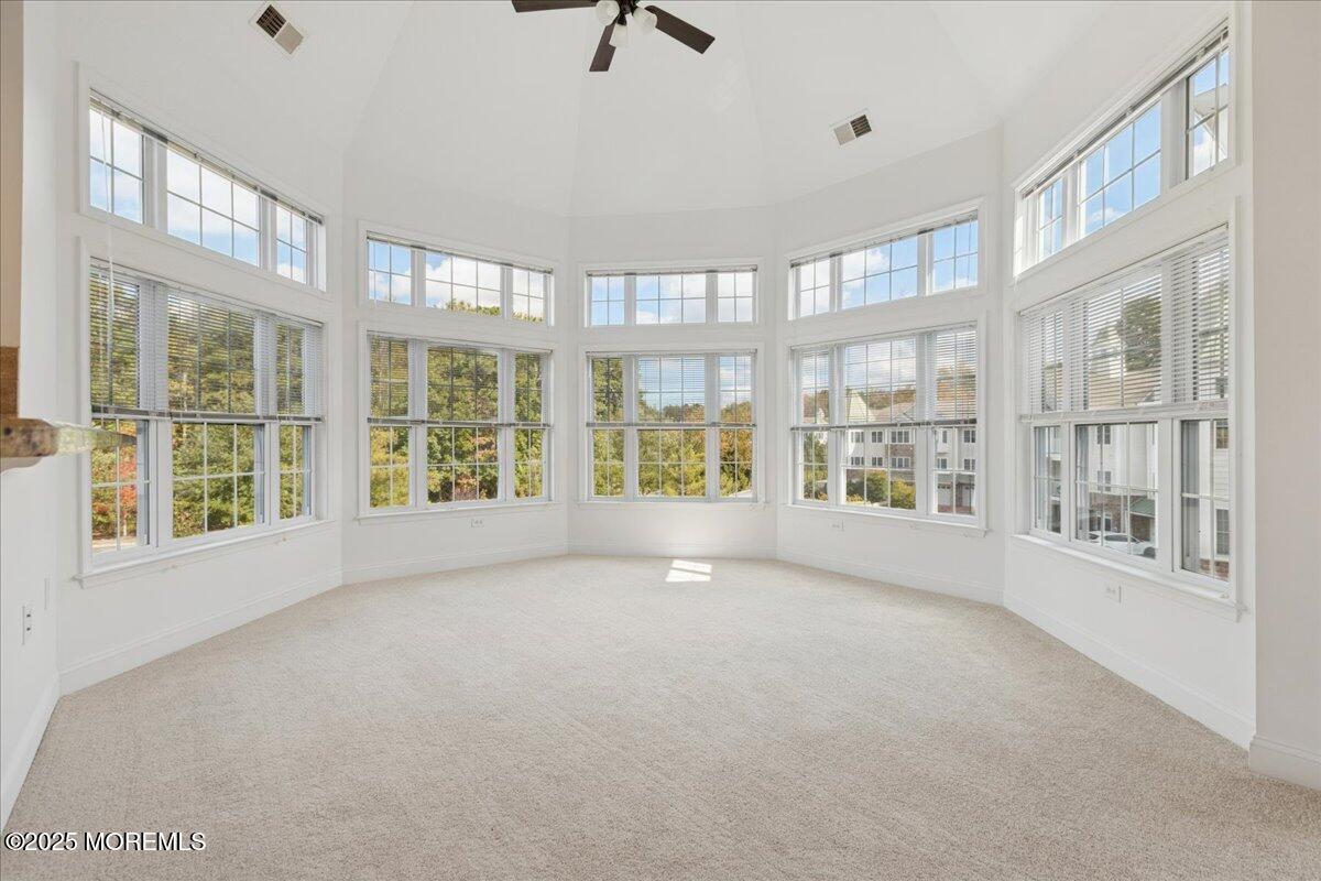 7317 Falston Circle, Unit 7317 Old Bridge, NJ 08857 - Photo 10 of 24 a view of an empty room with a window