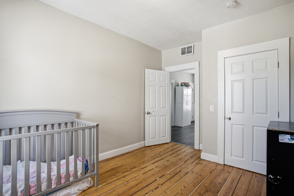 196 Irving Street Fall River, MA 02723 - Photo 21 of 34 a view of entryway with wooden floor