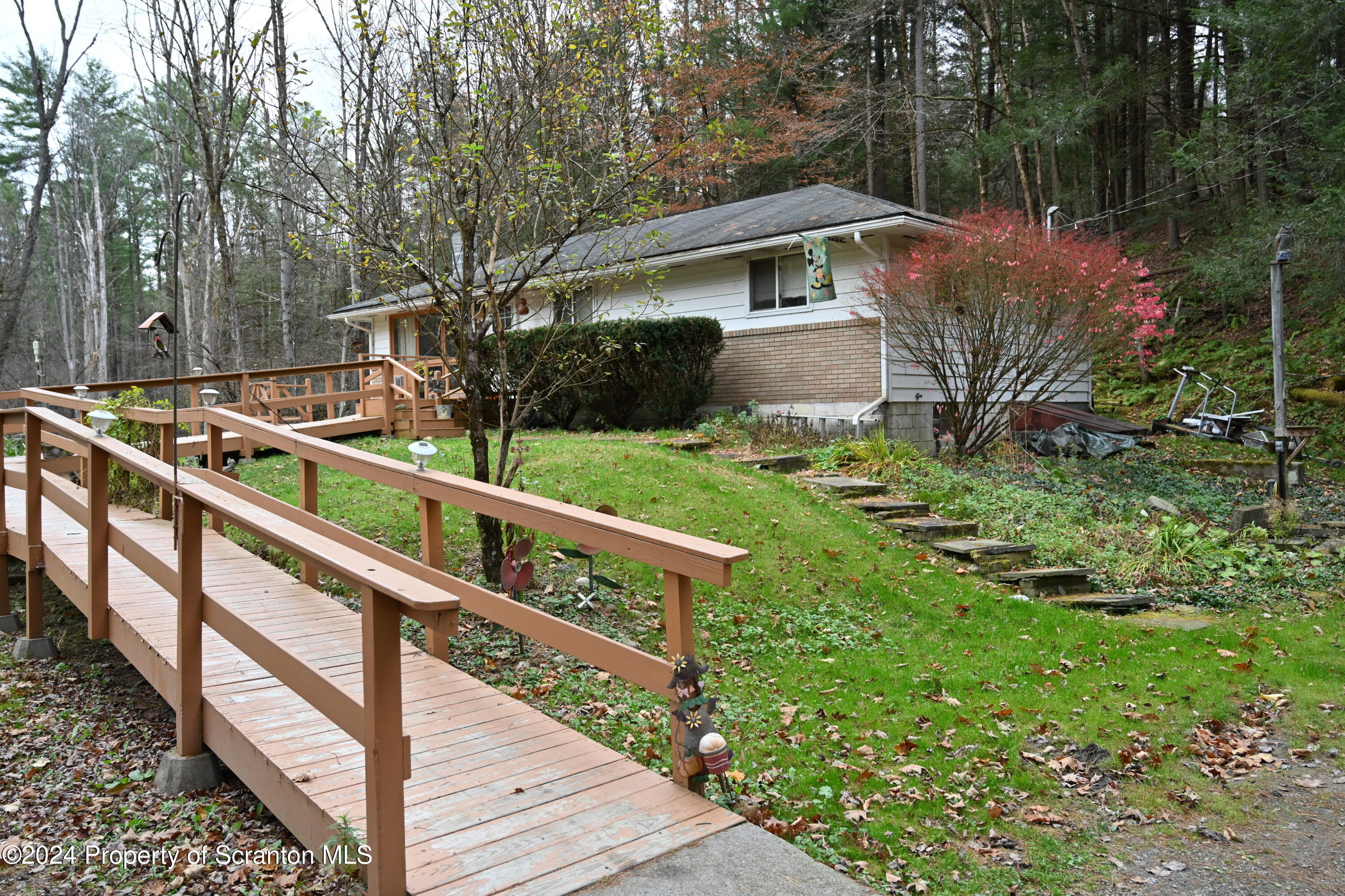 35 Pine Ayre Road Hallstead, PA 18822 - Photo 1 of 24 a view of a house with backyard and trees