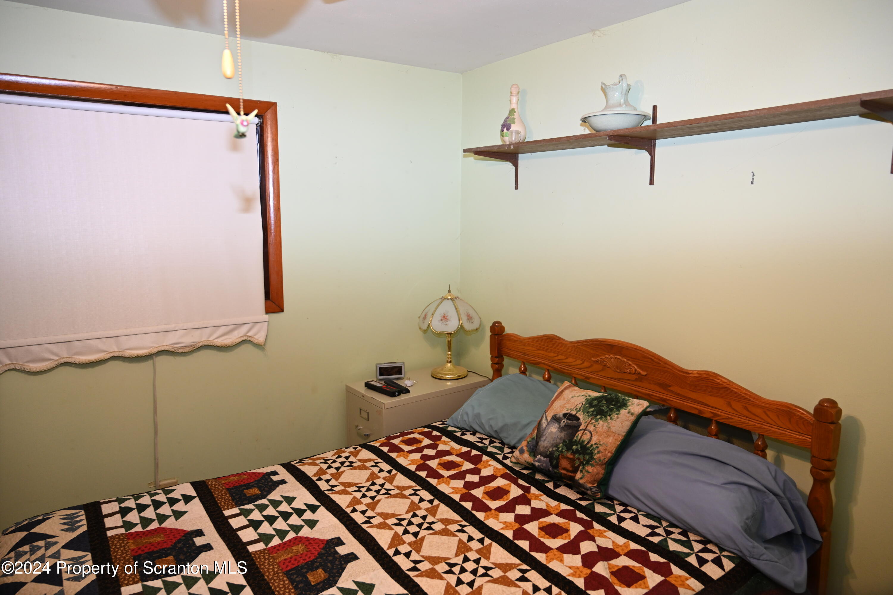 35 Pine Ayre Road Hallstead, PA 18822 - Photo 15 of 24 a bedroom with a bed and a dresser