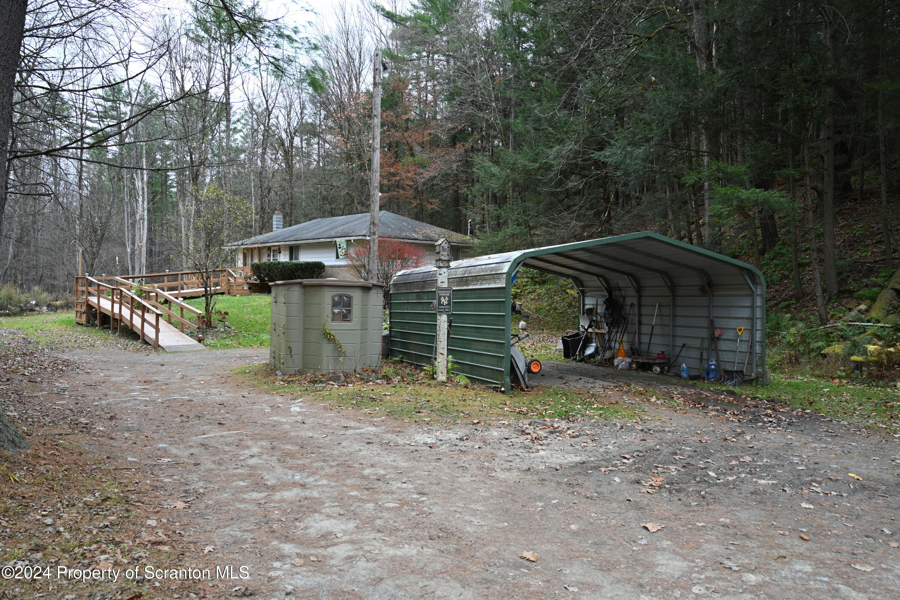 35 Pine Ayre Road Hallstead, PA 18822 - Photo 24 of 24 a view of a house with backyard and sitting area
