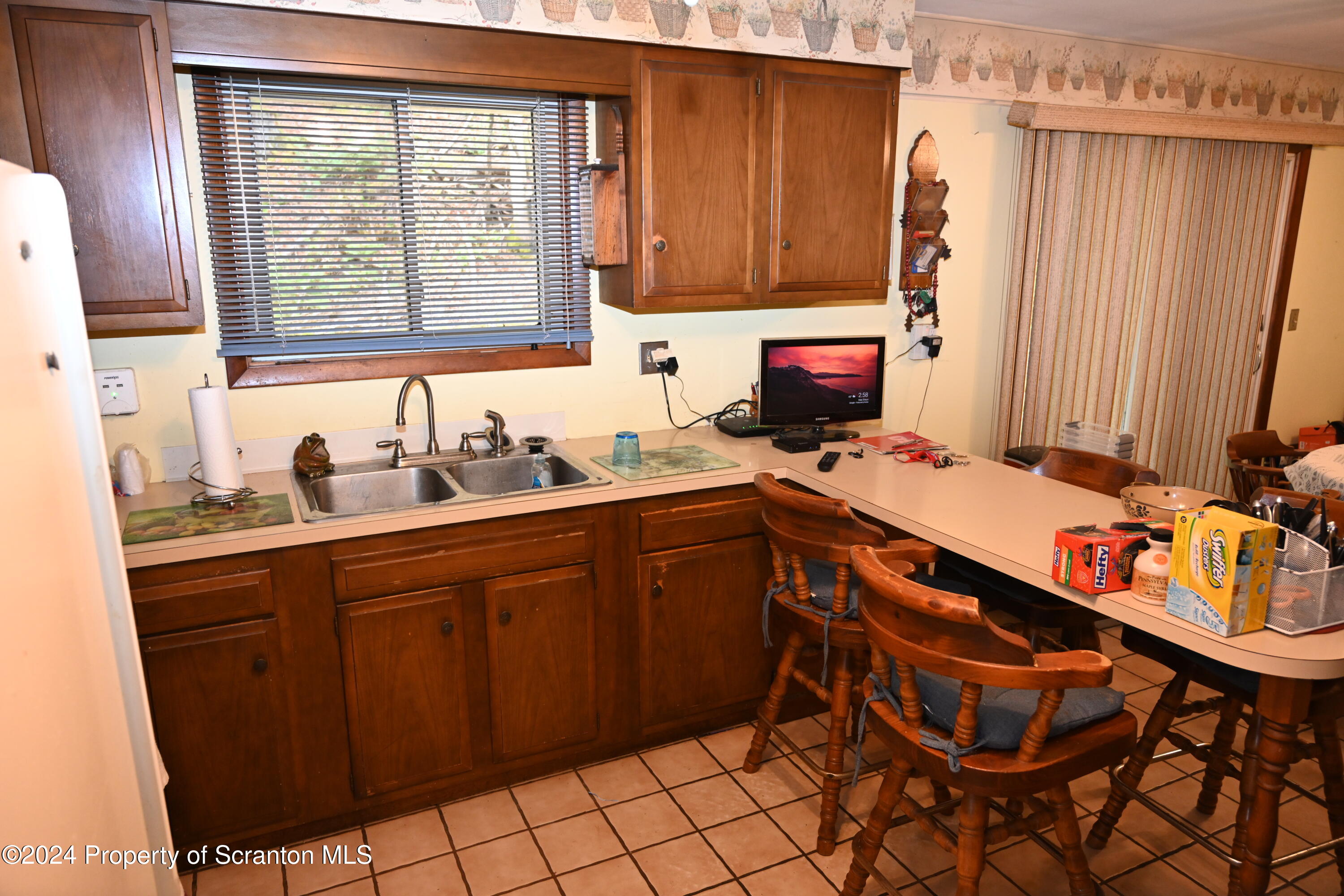 35 Pine Ayre Road Hallstead, PA 18822 - Photo 4 of 24 a kitchen with a sink and a stove top oven