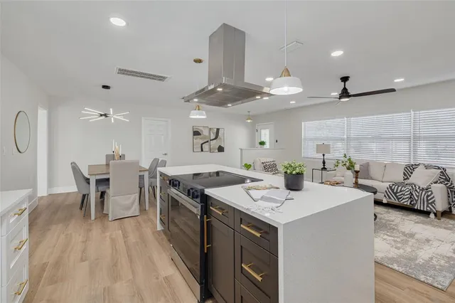 a kitchen with a stove and a table