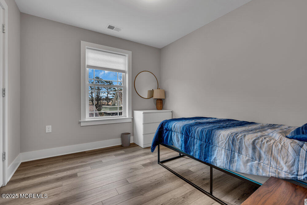 25 Seaton Road Toms River, NJ 08755 - Photo 33 of 52 a bedroom with a bed and a window