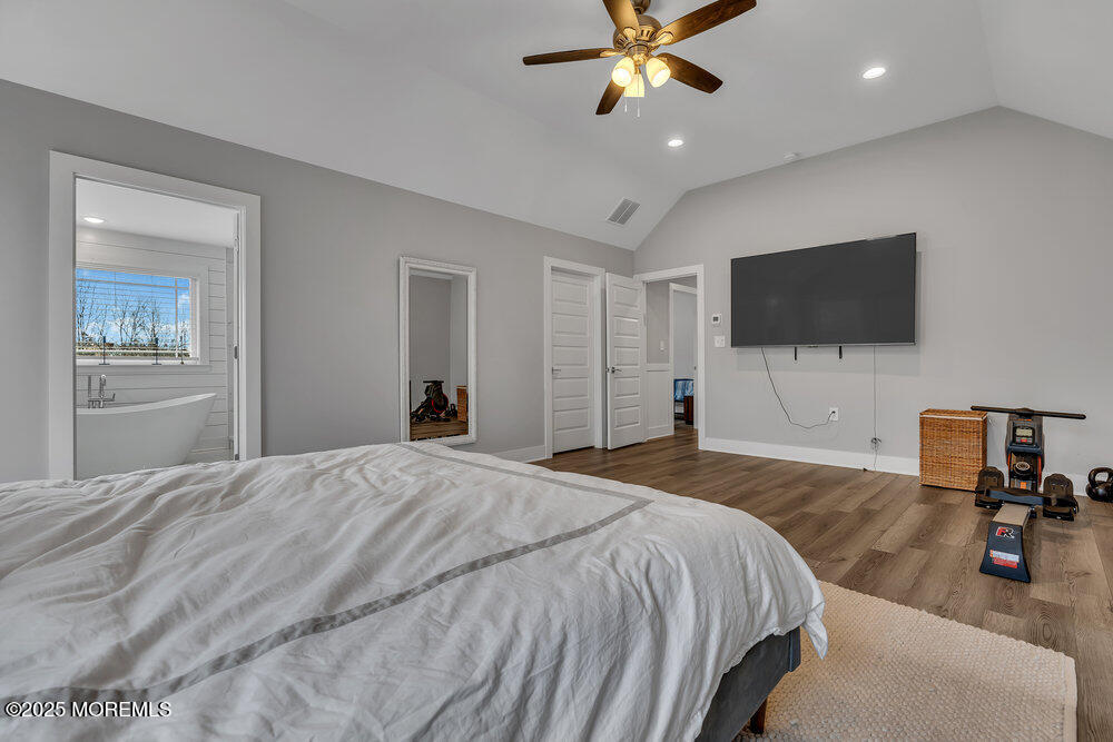 25 Seaton Road Toms River, NJ 08755 - Photo 36 of 52 a bedroom with a bed and a flat screen tv