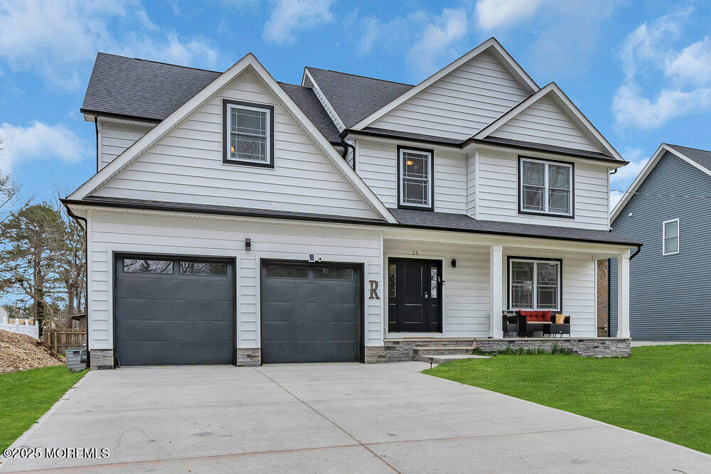 25 Seaton Road Toms River, NJ 08755 - Photo 5 of 52 a front view of a house with garden
