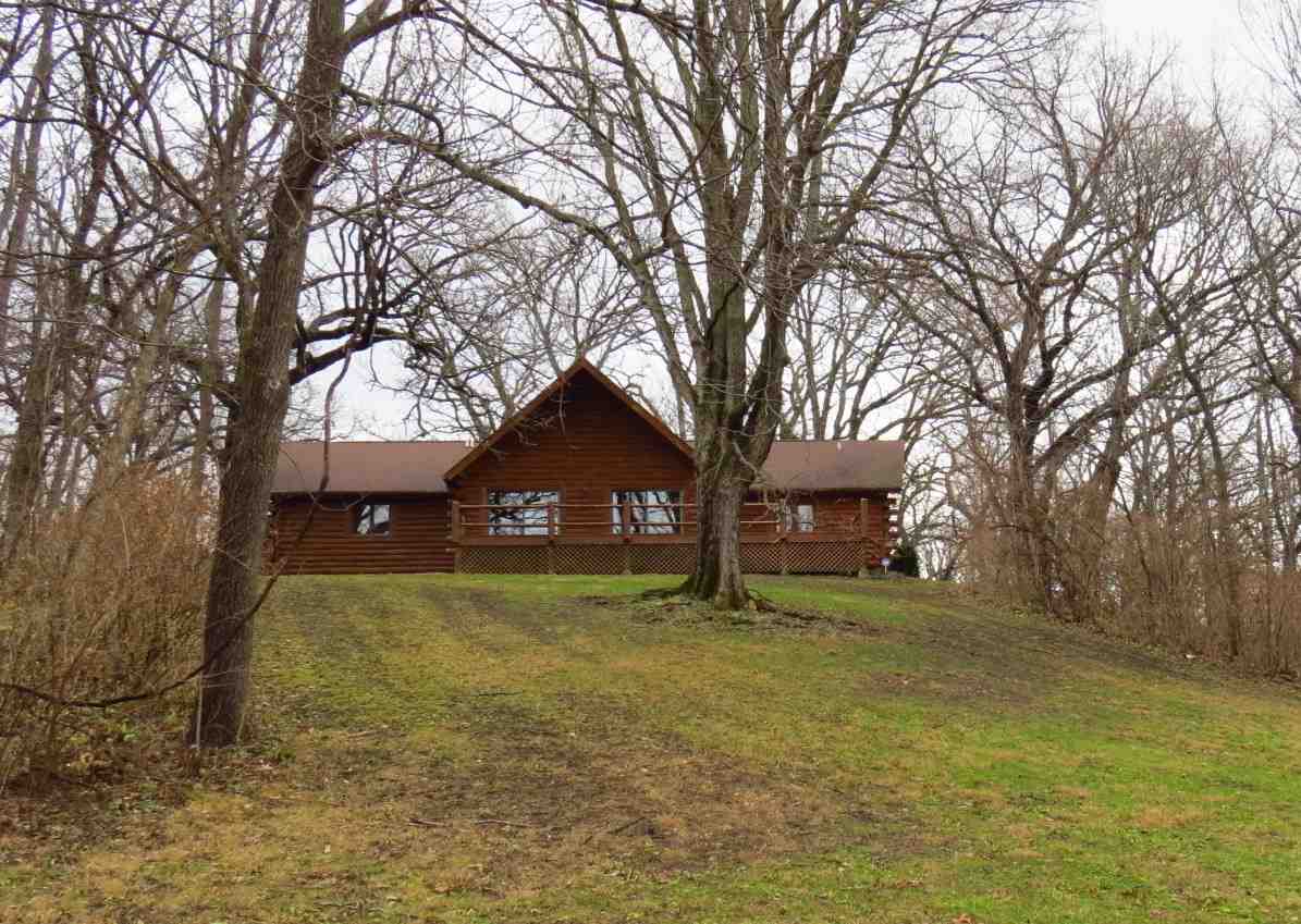 12444 Quail Ridge Close Rockton, IL 61072 - Photo 20 of 24 a view of a house with a yard