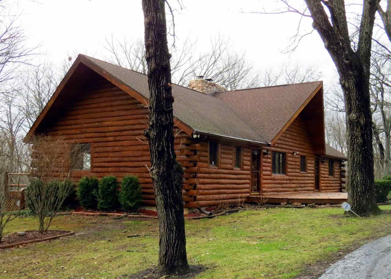 12444 Quail Ridge Close Rockton, IL 61072 - Photo 3 of 24 a view of a house with a yard