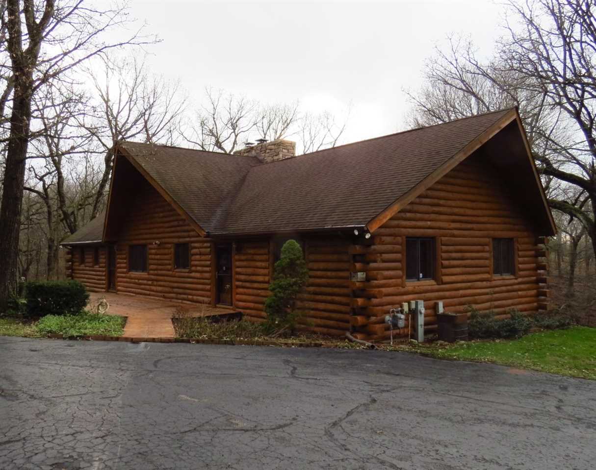 12444 Quail Ridge Close Rockton, IL 61072 - Photo 4 of 24 a front view of a house with a yard