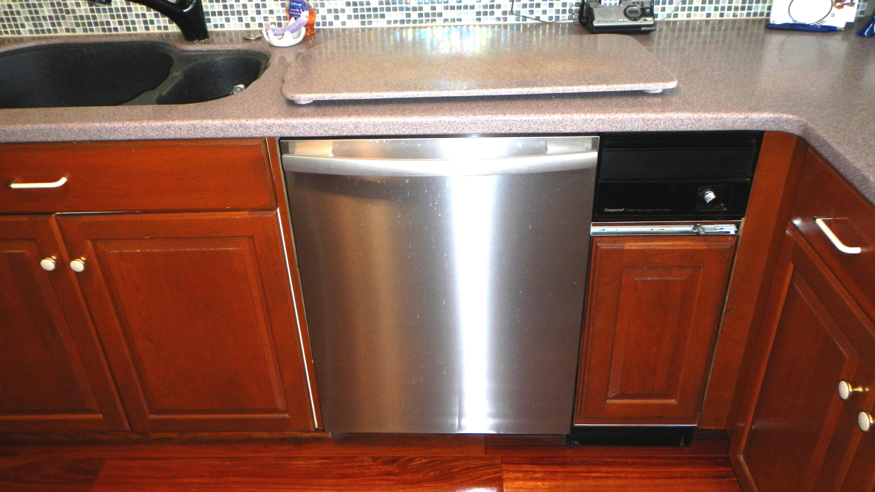 4640 Eastbourne Oxnard, CA 93035 - Photo 20 of 49 a view of cabinet with wooden floor