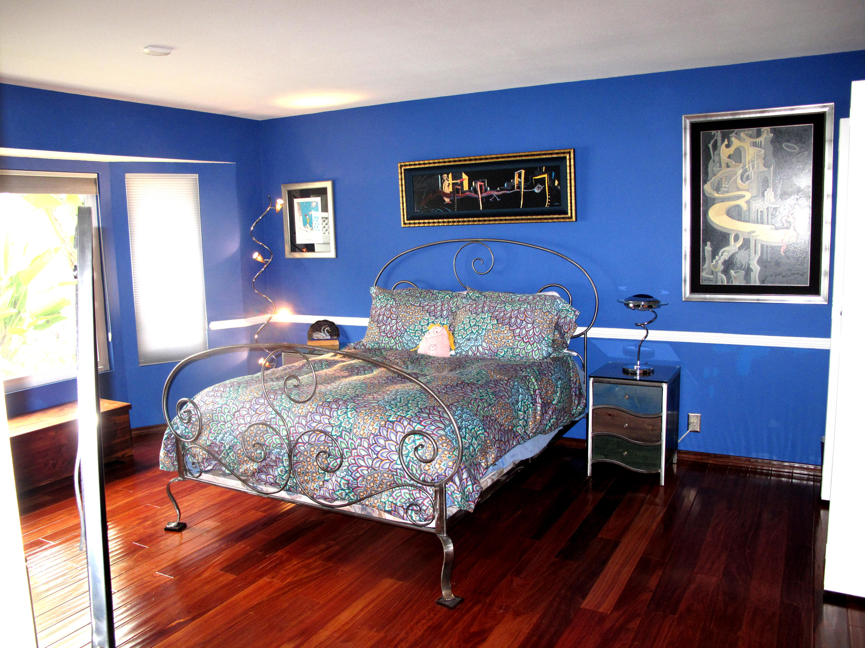 4640 Eastbourne Oxnard, CA 93035 - Photo 29 of 49 a bedroom with a bed and wooden floor