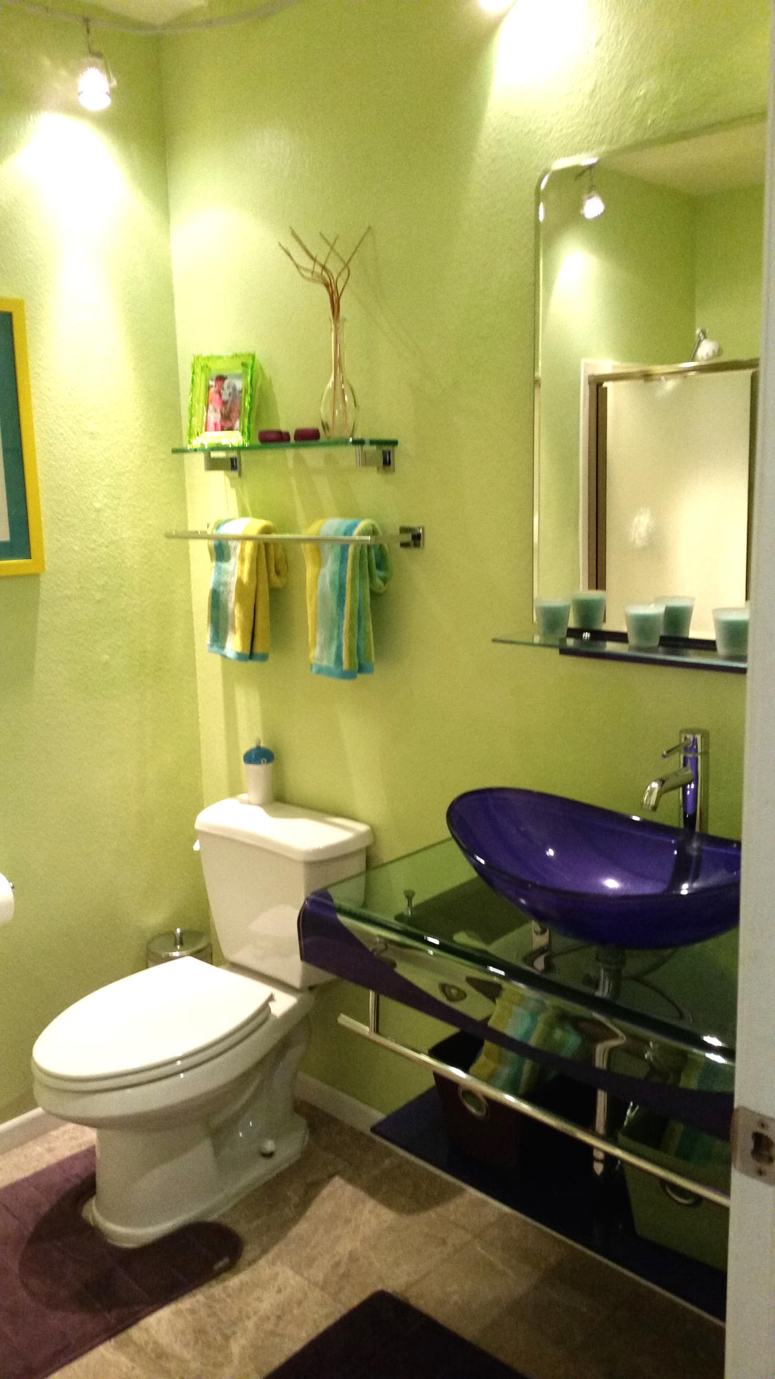 4640 Eastbourne Oxnard, CA 93035 - Photo 36 of 49 a bathroom with a toilet and a mirror