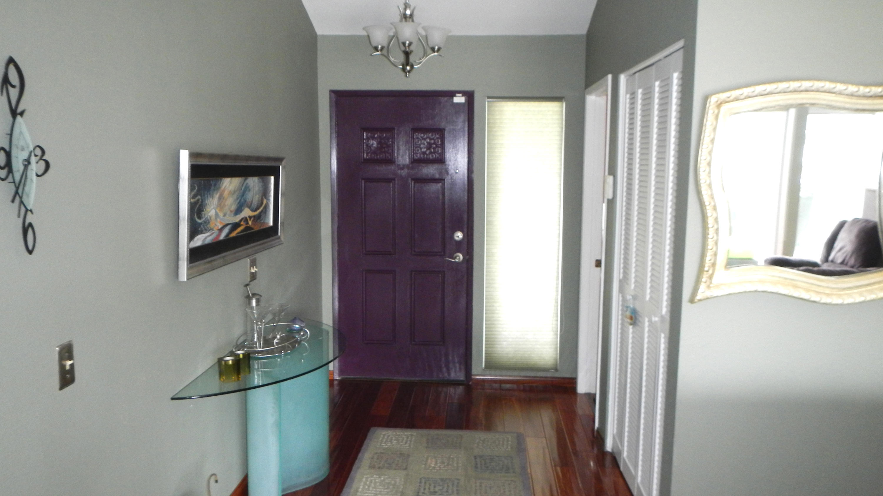4640 Eastbourne Oxnard, CA 93035 - Photo 43 of 49 a view of hallway with a front door and wooden floor