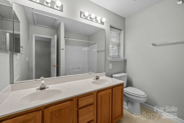 a bed room with a bed and a dresser