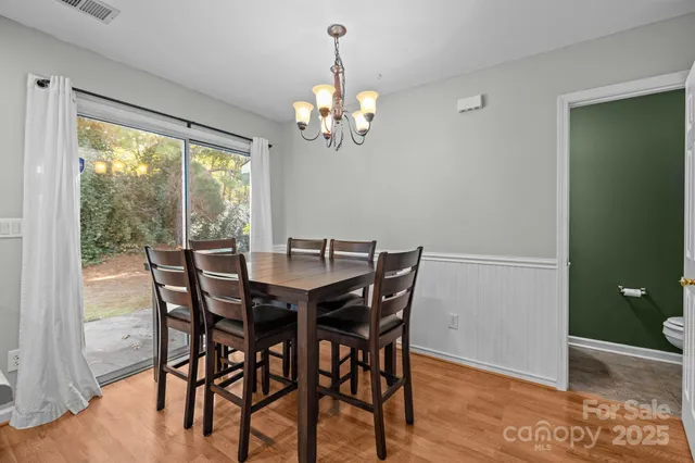 a bathroom with a sink a mirror and a shower