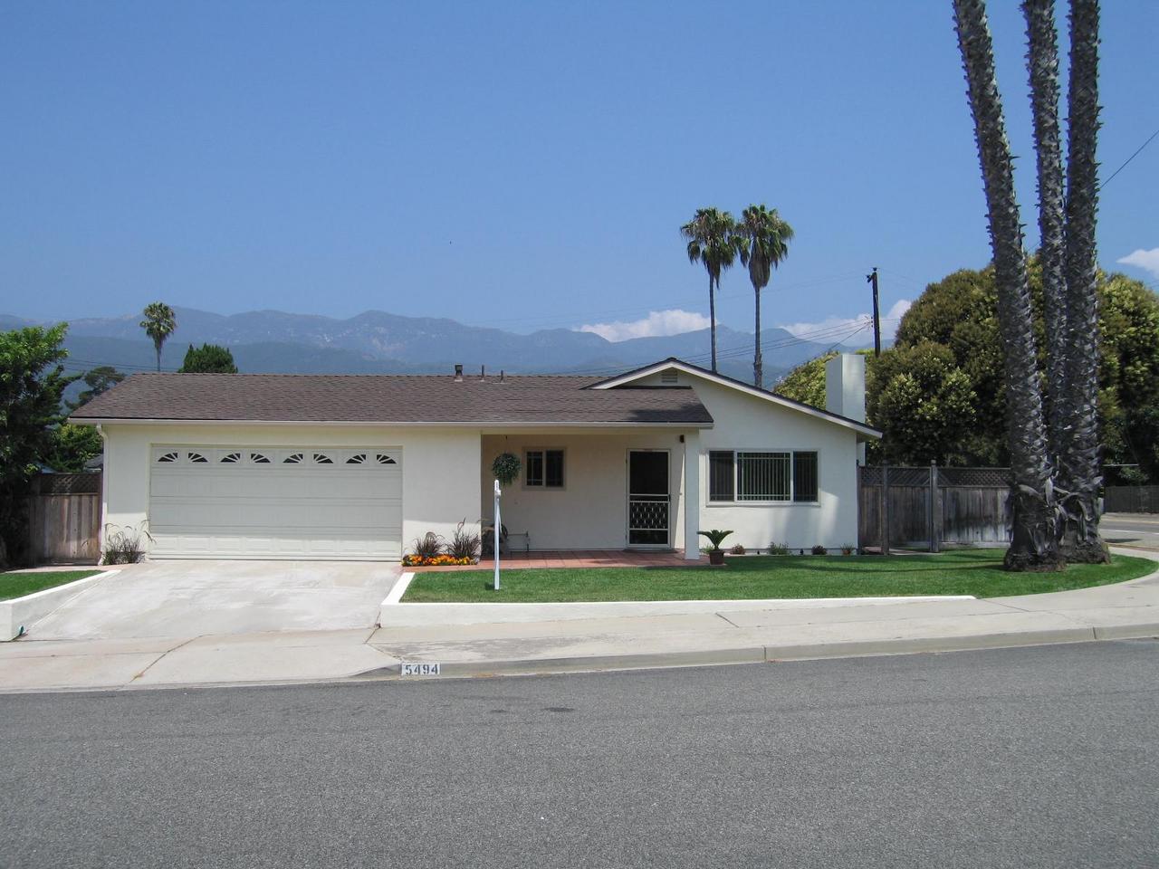 5494 Shemara Street Carpinteria, CA 93013 - Photo 1 of 8 a front view of a house with a yard
