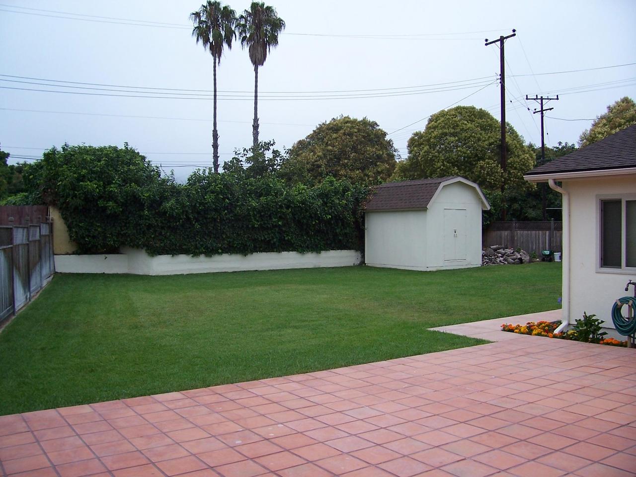 5494 Shemara Street Carpinteria, CA 93013 - Photo 2 of 8 a front view of a house with garden
