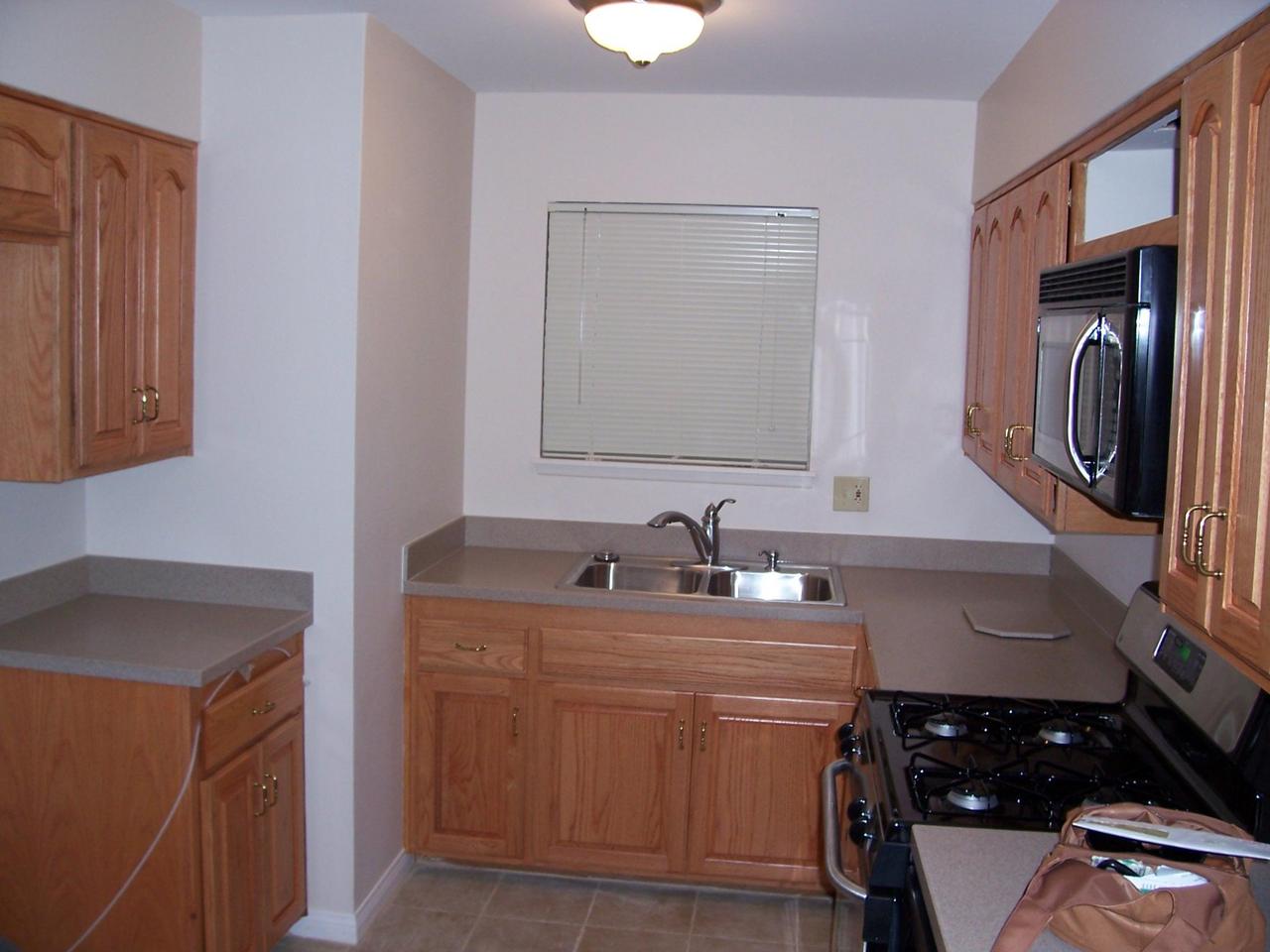 5494 Shemara Street Carpinteria, CA 93013 - Photo 4 of 8 a bathroom with a sink and a mirror