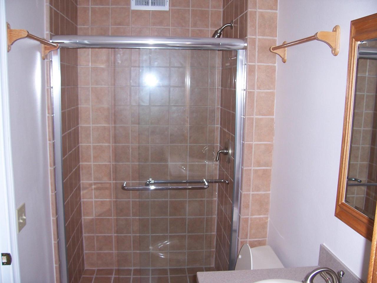 5494 Shemara Street Carpinteria, CA 93013 - Photo 5 of 8 a bathroom with a shower