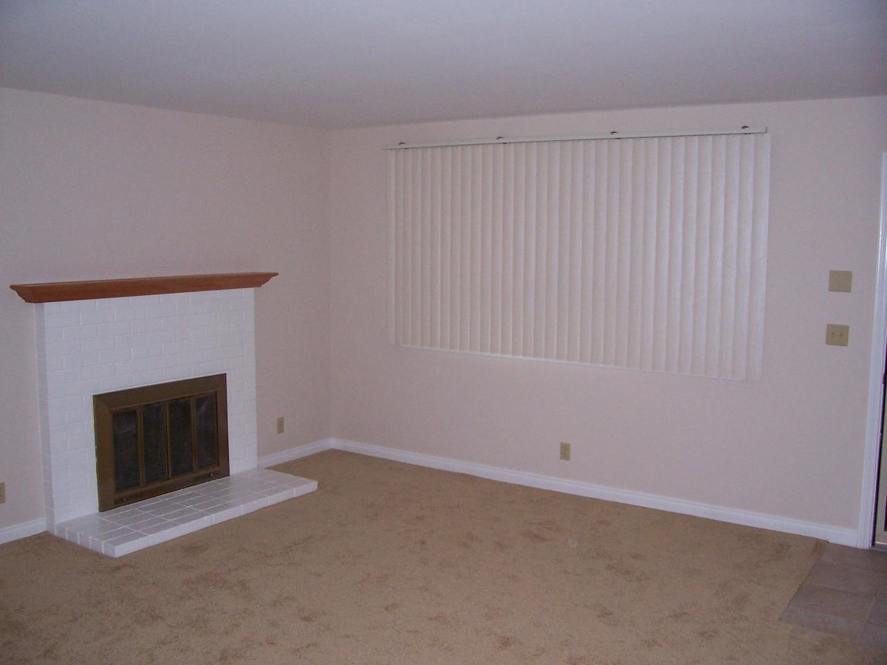 5494 Shemara Street Carpinteria, CA 93013 - Photo 6 of 8 a room with a fireplace