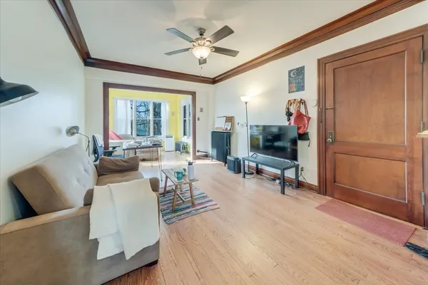 a living room with furniture and a window
