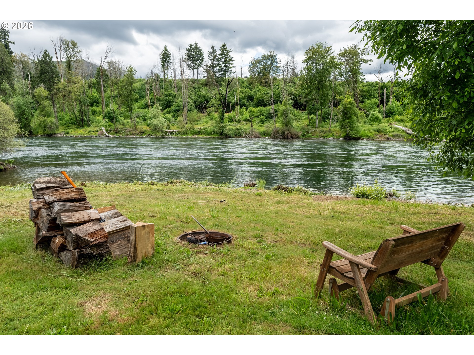 45542 South Gate Creek Road Vida, OR 97488 - Photo 20 of 46 a view of a lake with outdoor seating