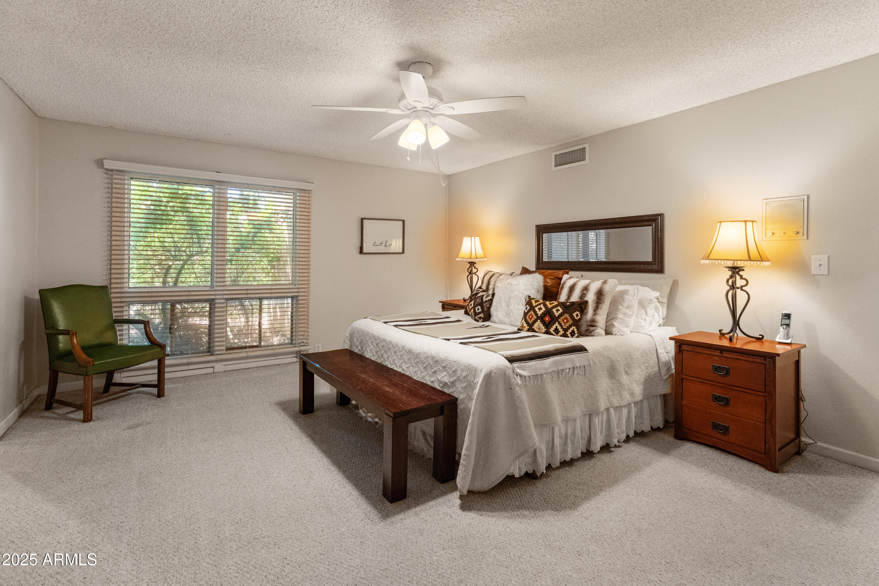 6931 East Pershing Avenue Scottsdale, AZ 85254 - Photo 12 of 59 a bedroom with bed and window