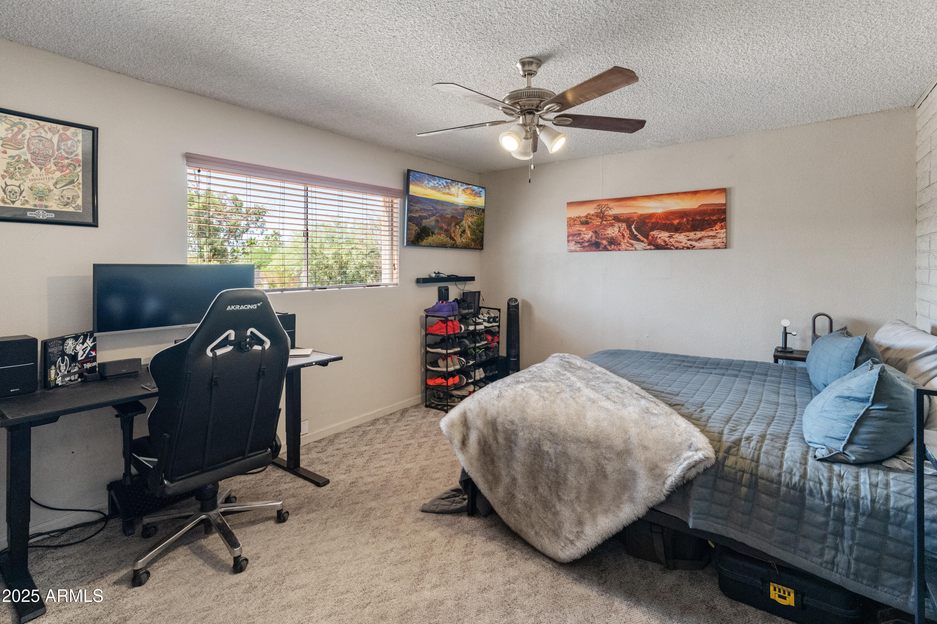 6931 East Pershing Avenue Scottsdale, AZ 85254 - Photo 16 of 59 a bedroom with a bed and a desk