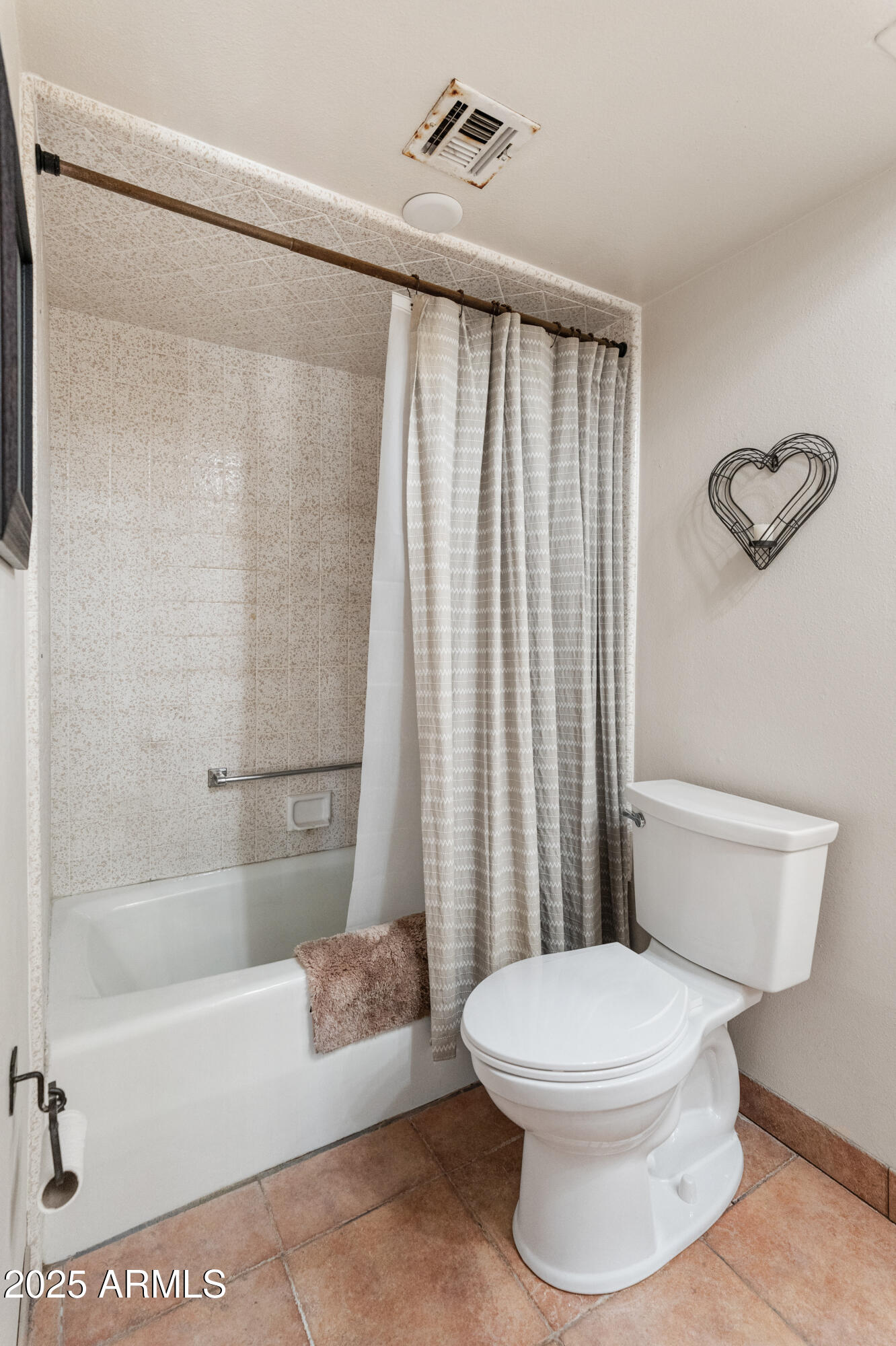 6931 East Pershing Avenue Scottsdale, AZ 85254 - Photo 17 of 59 a bathroom with a toilet and a shower