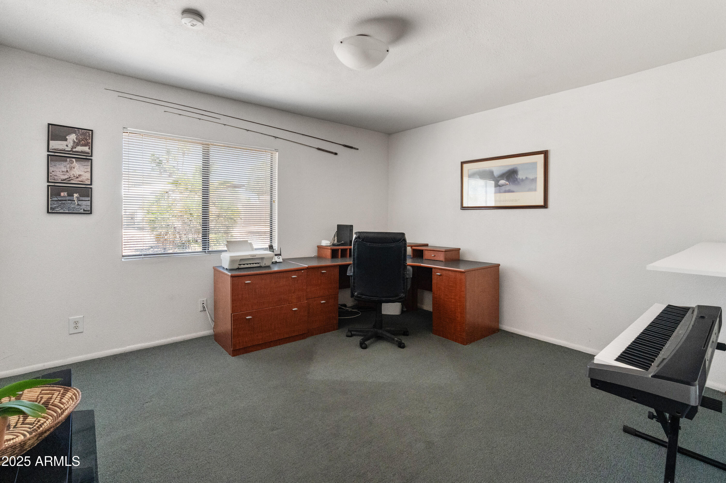 6931 East Pershing Avenue Scottsdale, AZ 85254 - Photo 21 of 59 a room with furniture and a window