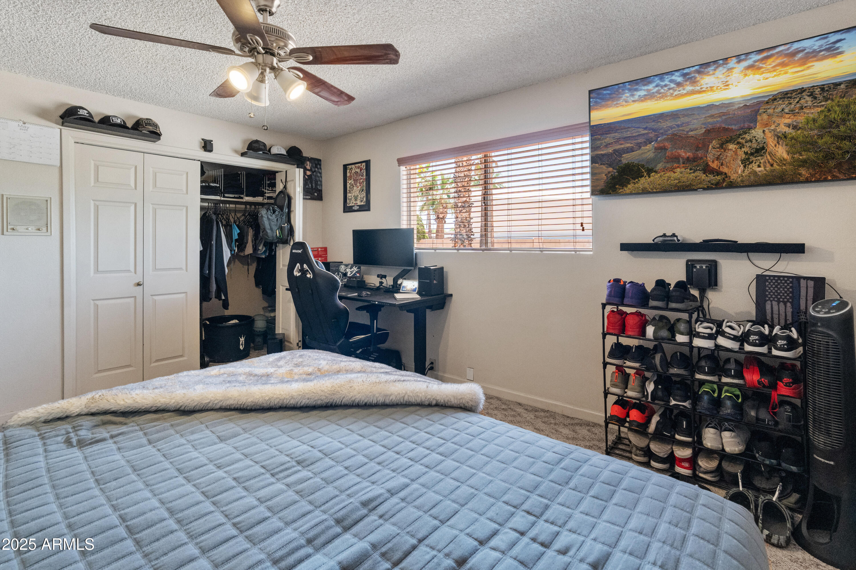 6931 East Pershing Avenue Scottsdale, AZ 85254 - Photo 22 of 59 a bedroom with a bed and a window