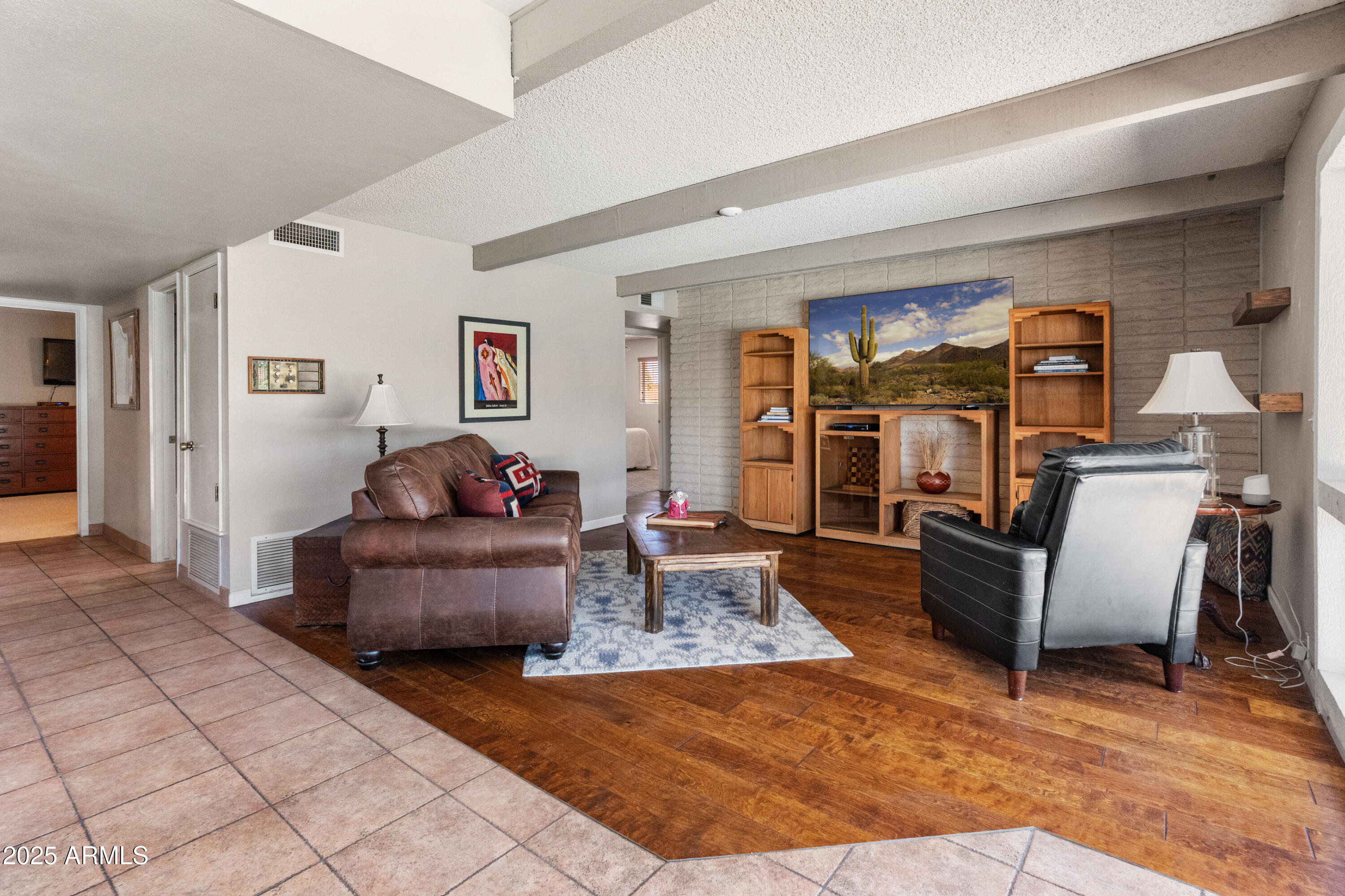 6931 East Pershing Avenue Scottsdale, AZ 85254 - Photo 26 of 59 a living room with furniture and a couch