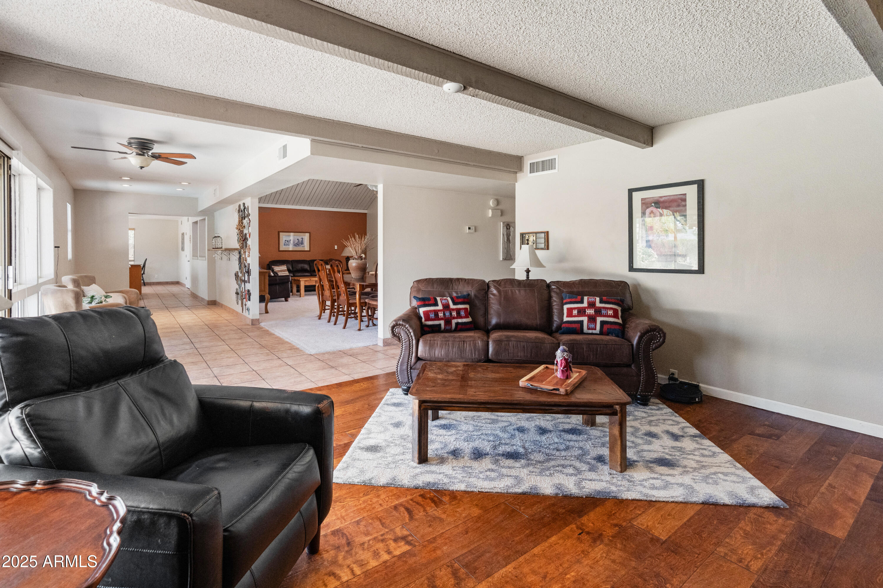 6931 East Pershing Avenue Scottsdale, AZ 85254 - Photo 28 of 59 a living room with furniture and a rug