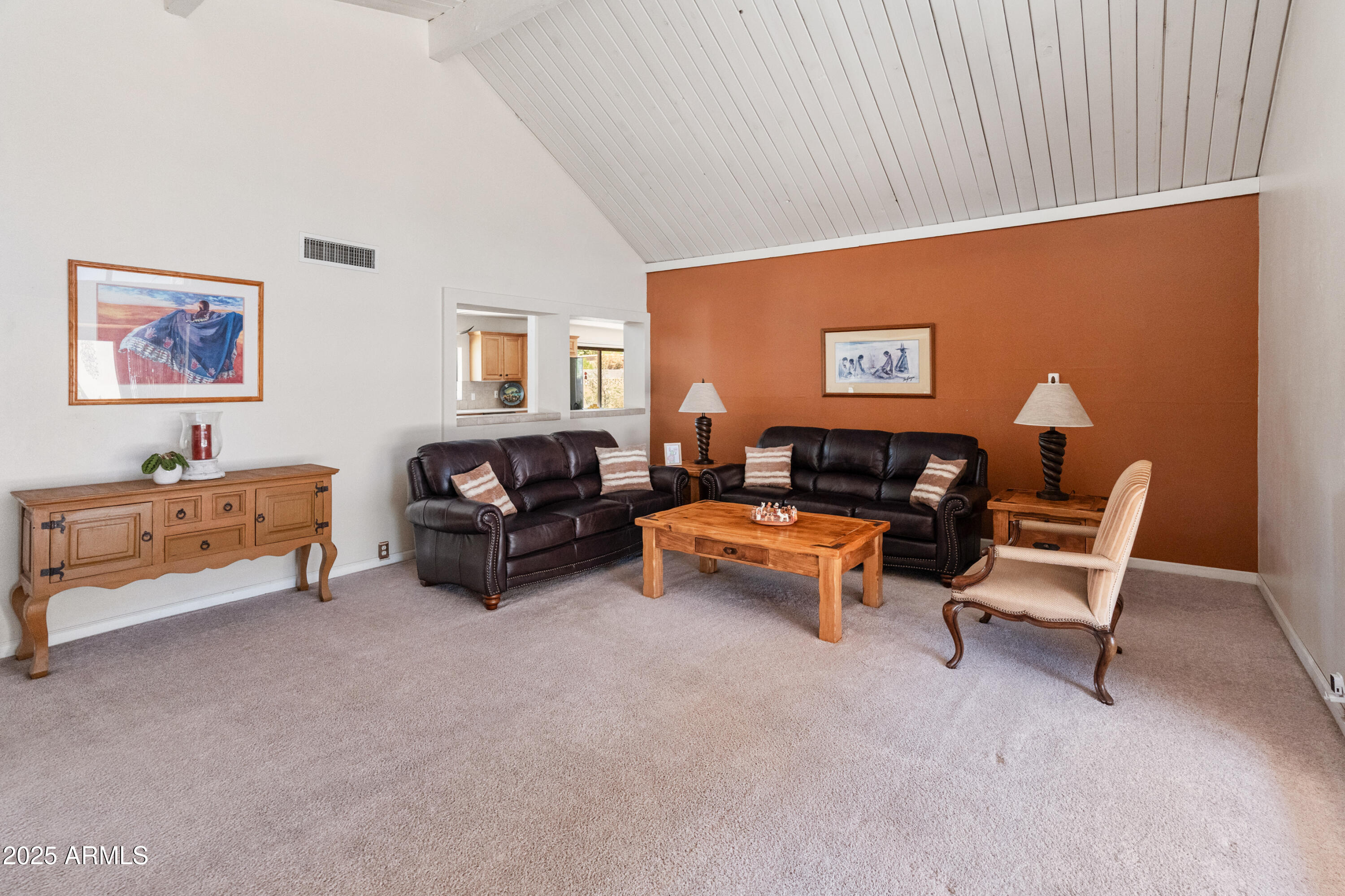 6931 East Pershing Avenue Scottsdale, AZ 85254 - Photo 32 of 59 a living room with furniture and a couch