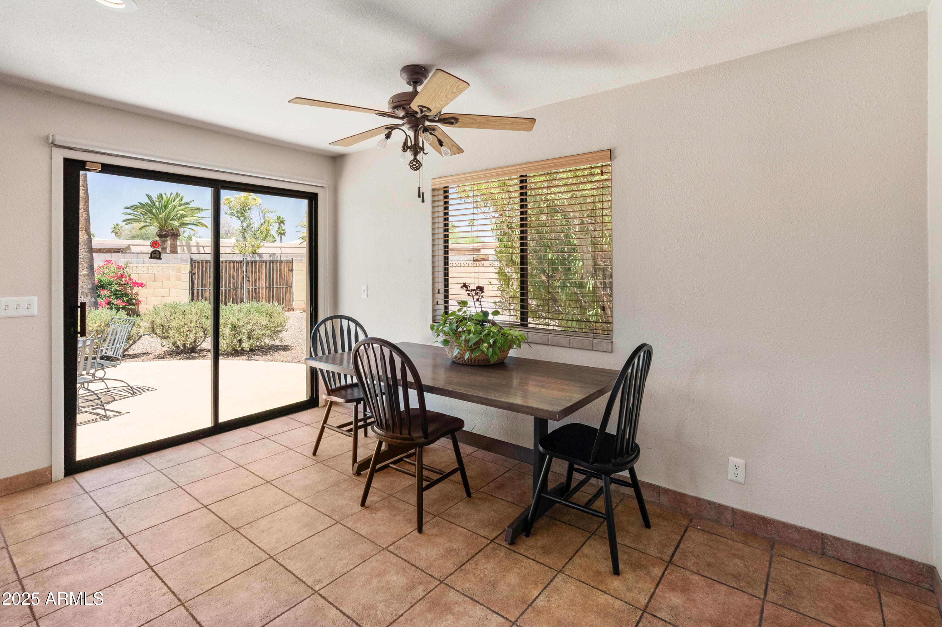 6931 East Pershing Avenue Scottsdale, AZ 85254 - Photo 37 of 59 a view of a dining room with furniture window and outside view