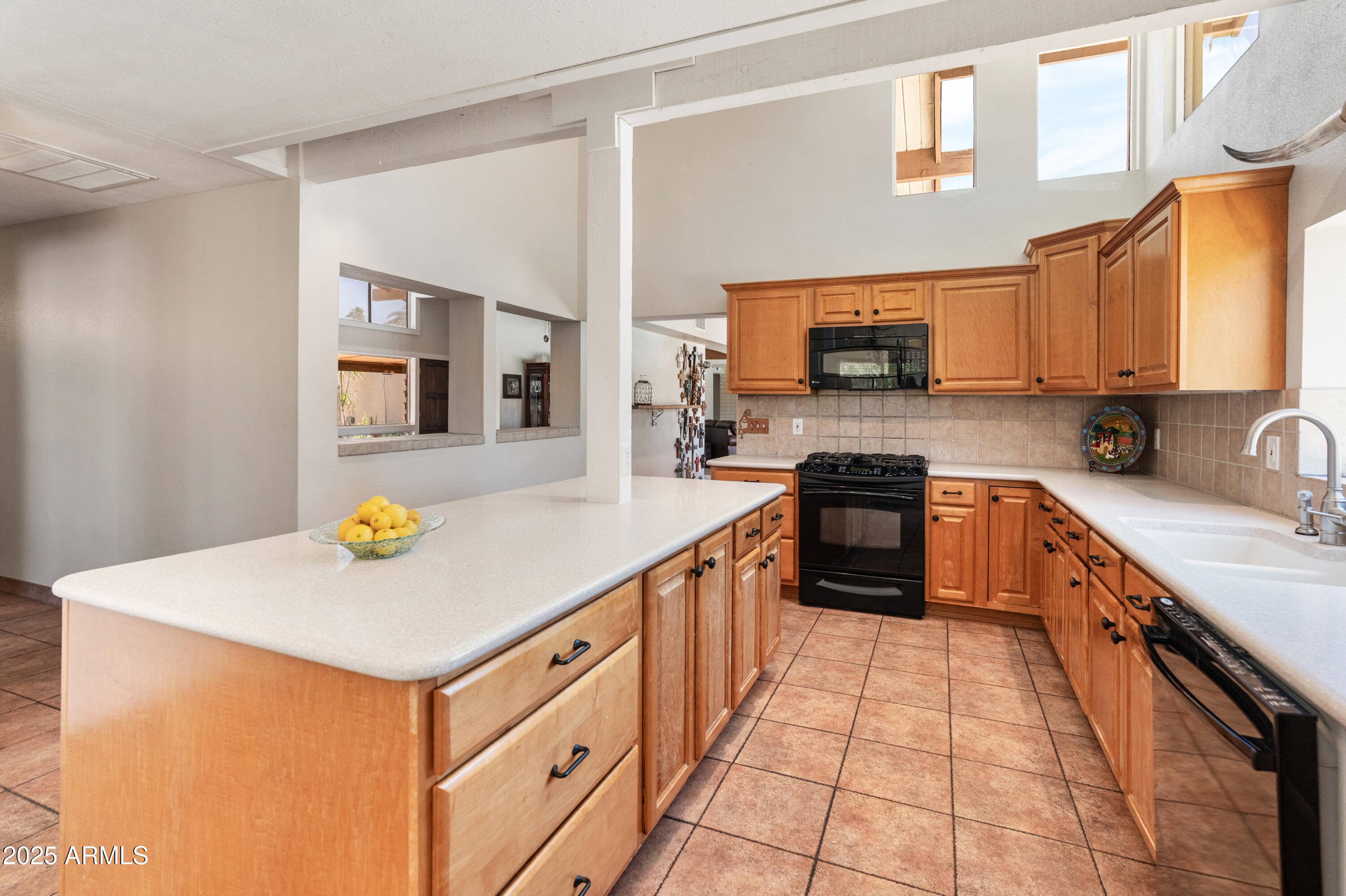 6931 East Pershing Avenue Scottsdale, AZ 85254 - Photo 39 of 59 a kitchen with a sink cabinets and appliances